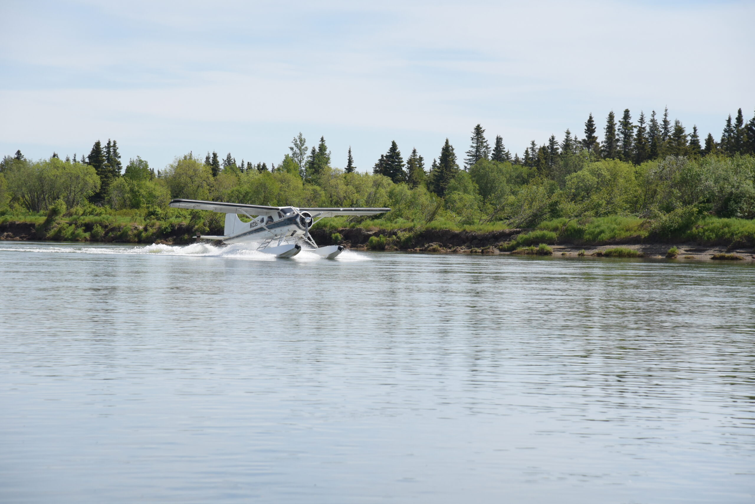 Floatplane landing on the Nushagak River near Fish The Nush lodge