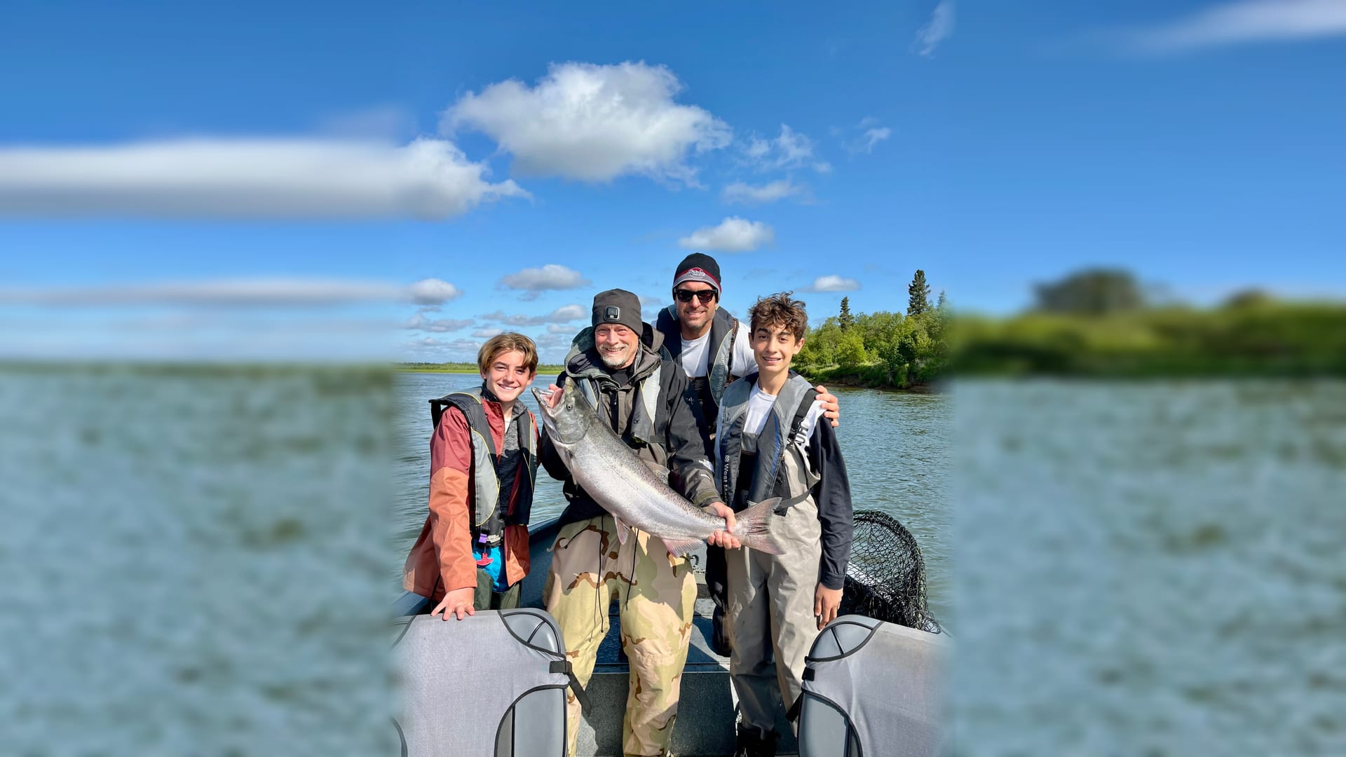A family with their king salmon on the Nushagak River
